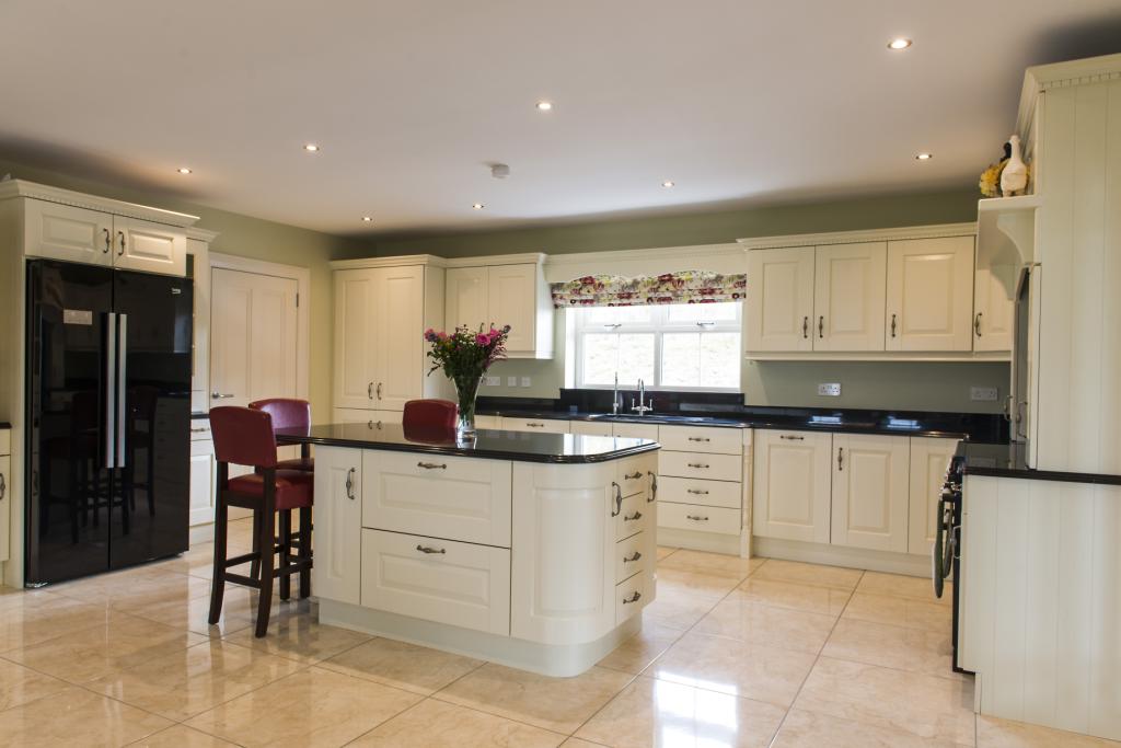 Ivory Kitchen With Black Granite